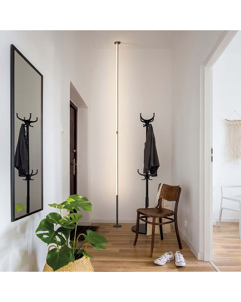 Designer LED lamp, 36W rigid rotating column, floor to ceiling, 3000K dimmable, and available in white or black finish