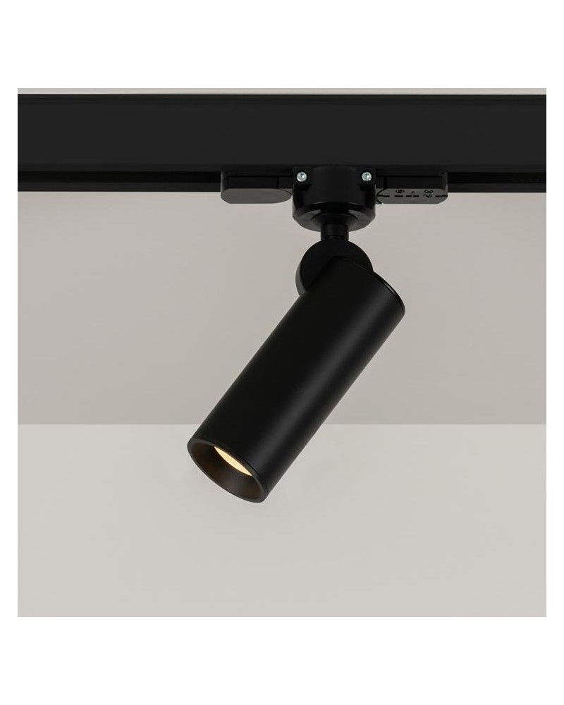 Foco de carril cilindro liso 4cm con aro decorativo de acero LED 5W 2700K 500Lm regulable adaptador monofásico oscilante